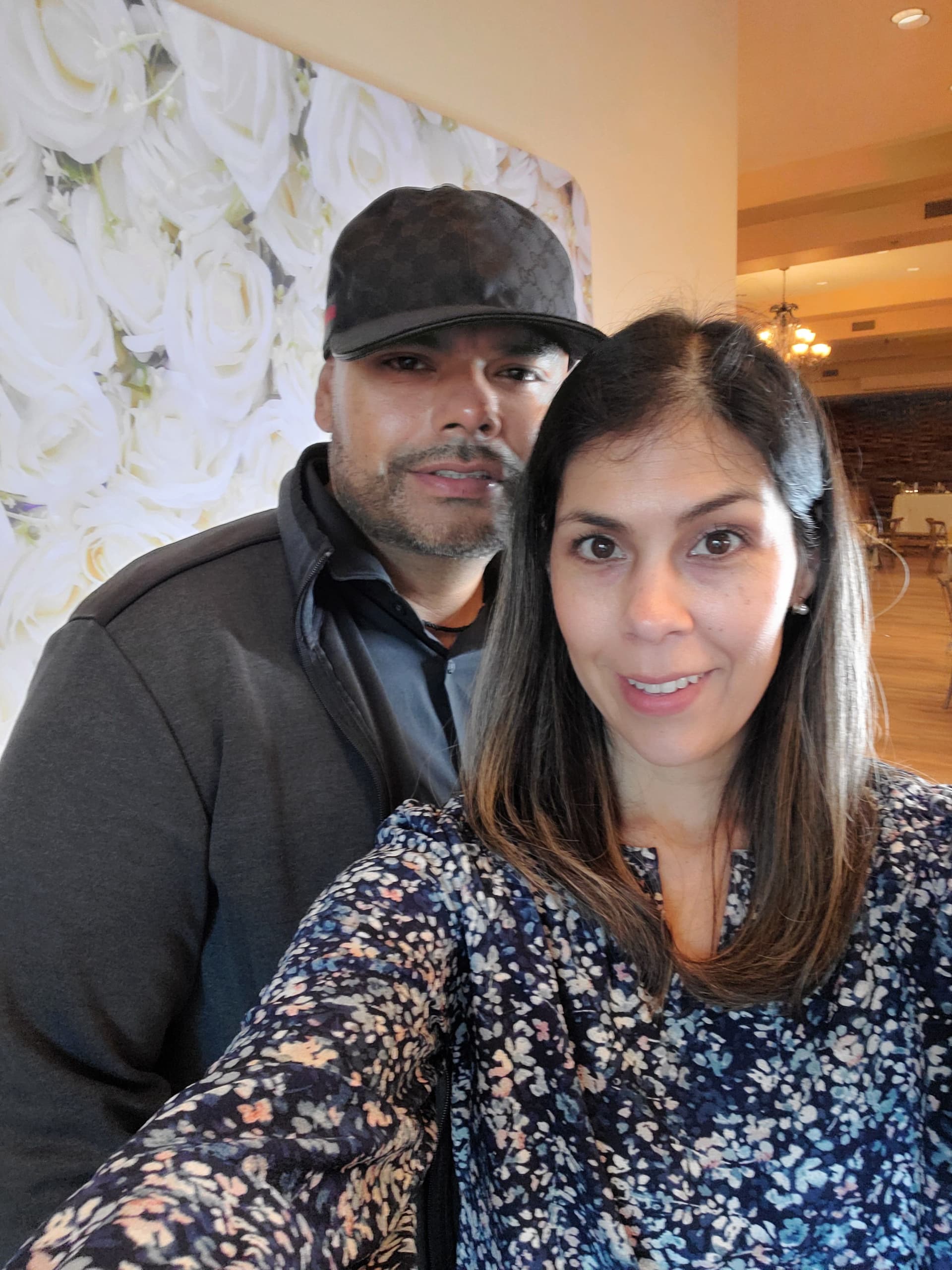 A picture of the owners at a beautiful wedding.